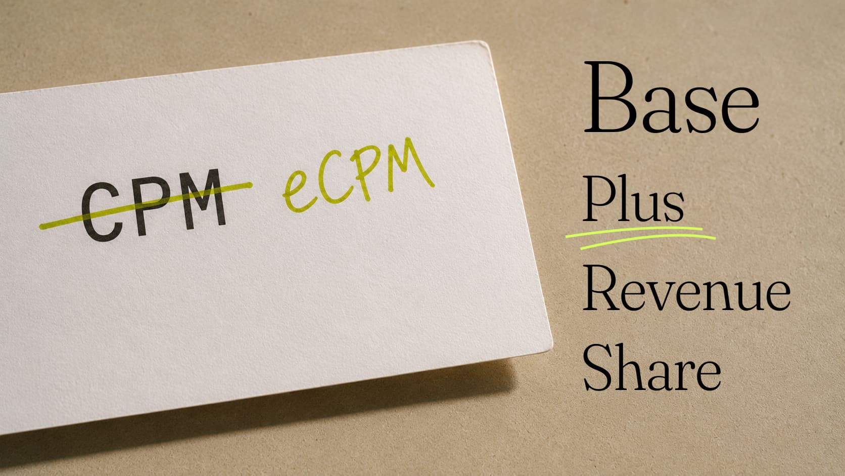 An index card with CPM struck out and eCPM handwritten over it in green. Set beside the words: Base Plus Revenue Share, Plus underlined in green.